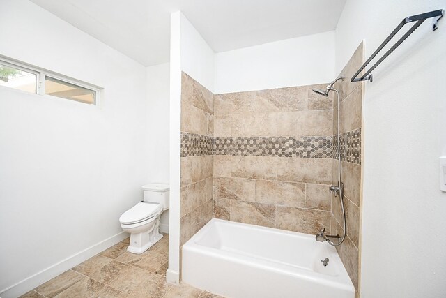 30626 Logger Ln, Magnolia, TX 77355 - full bath featuring toilet, baseboards, shower / bathtub combination, and tile patterned floors