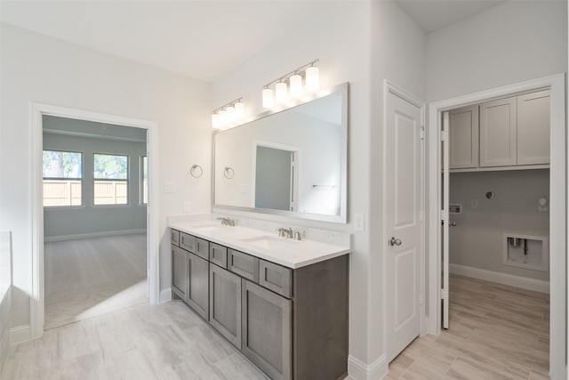 bathroom featuring vanity and hardwood / wood-style flooring