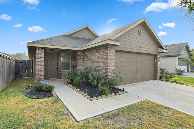 ranch-style house with a front yard and a garage