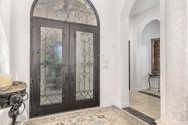 entryway featuring french doors