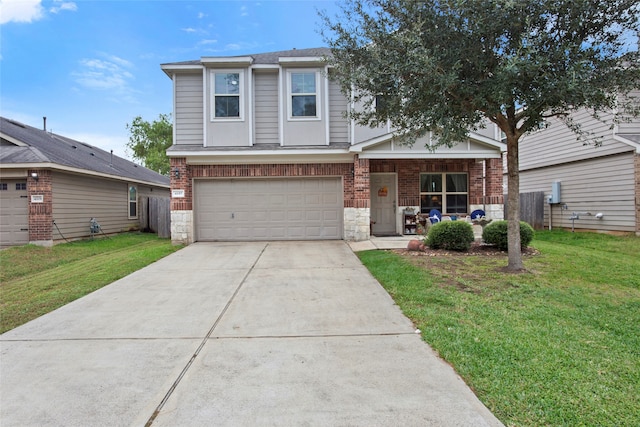 view of front of property with a front lawn and a garage