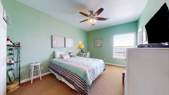 carpeted bedroom with ceiling fan