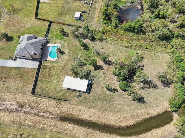 bird's eye view with a rural view and a water view