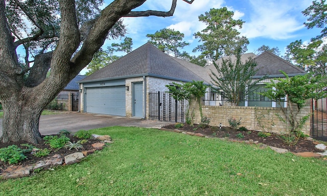 exterior space with a lawn and a garage