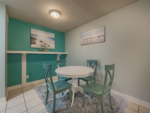 view of tiled dining space