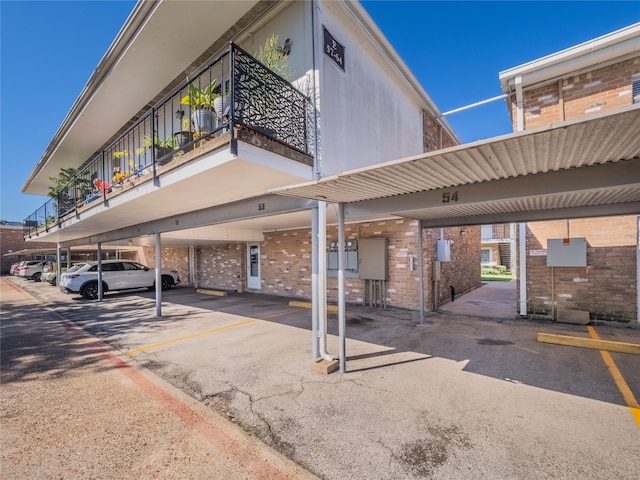 exterior space featuring a carport