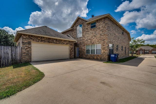 208 Cobblestone Cir, Red Oak, TX 75154 - view of front of house with roof with shingles, driveway, fence, a garage, and brick siding