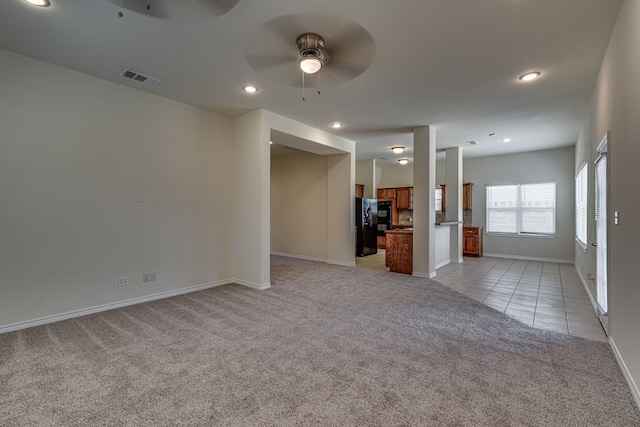 208 Cobblestone Cir, Red Oak, TX 75154 - unfurnished room featuring light carpet, baseboards, visible vents, and ceiling fan