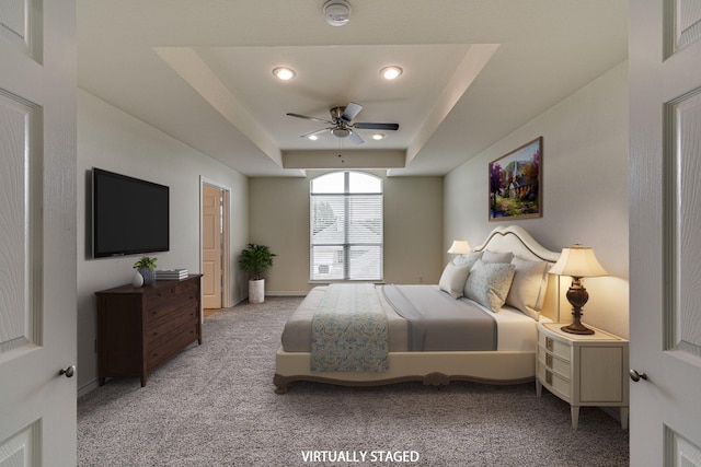 208 Cobblestone Cir, Red Oak, TX 75154 - bedroom featuring recessed lighting, ceiling fan, light carpet, and a tray ceiling