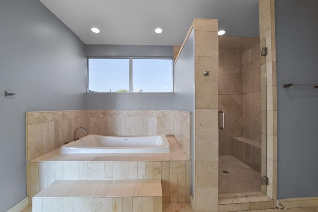 bathroom with tile patterned floors, a garden tub, recessed lighting, and a stall shower