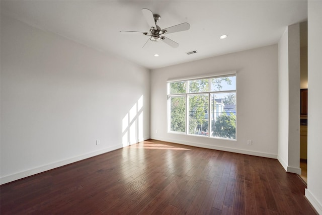 interior space with dark wood-style floors, baseboards, visible vents, recessed lighting, and a ceiling fan