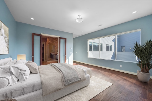 bedroom featuring dark wood-type flooring