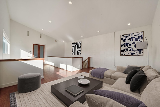 living area with lofted ceiling, wood finished floors, and recessed lighting