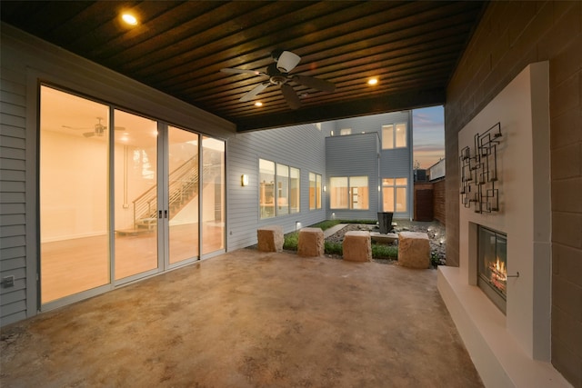 patio terrace at dusk with ceiling fan