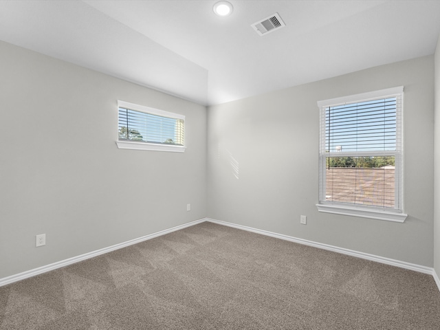 spare room with carpet flooring