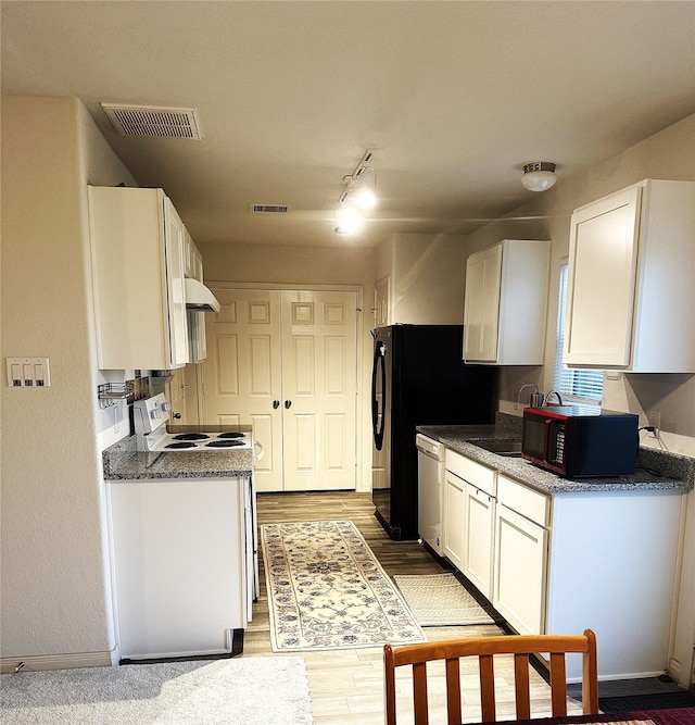 kitchen with white electric range, dishwasher, white cabinets, and dark wood-type flooring