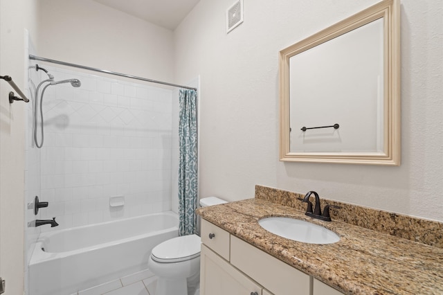 full bathroom featuring vanity, shower / tub combo with curtain, tile patterned floors, and toilet