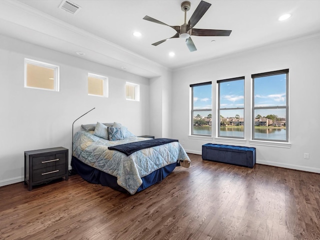 bedroom featuring recessed lighting, wood finished floors, visible vents, and baseboards