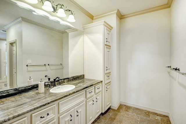 bathroom with vanity and ornamental molding