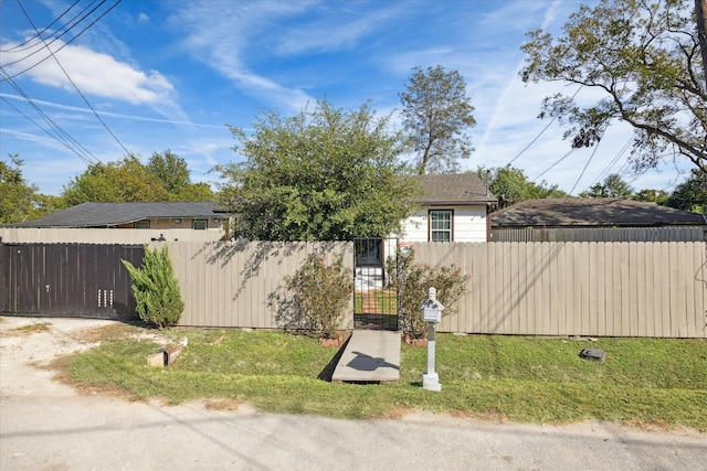 exterior space with a front lawn