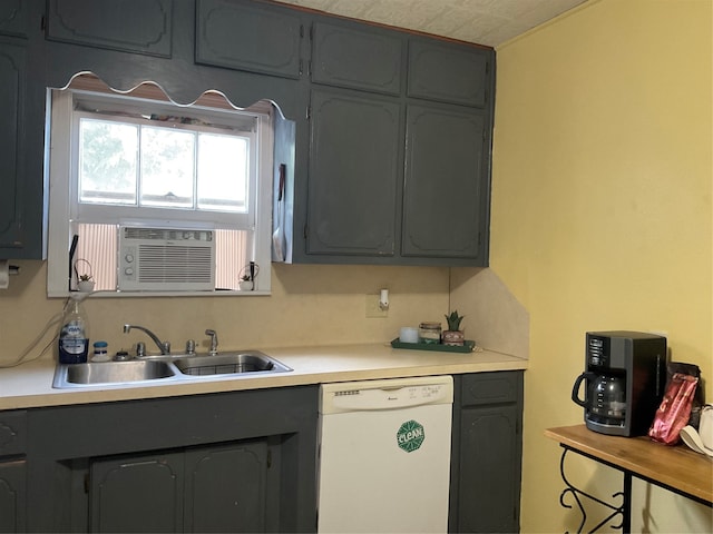 kitchen with cooling unit, sink, and white dishwasher