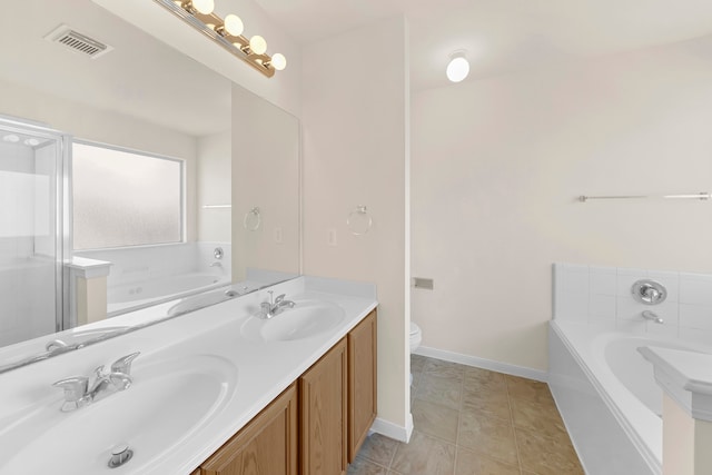 full bathroom with toilet, shower with separate bathtub, vanity, and tile patterned floors