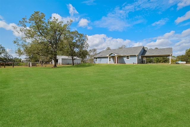 10723 Fm 442nd Rd, Boling, TX 77420 - view of grassy yard with an attached carport
