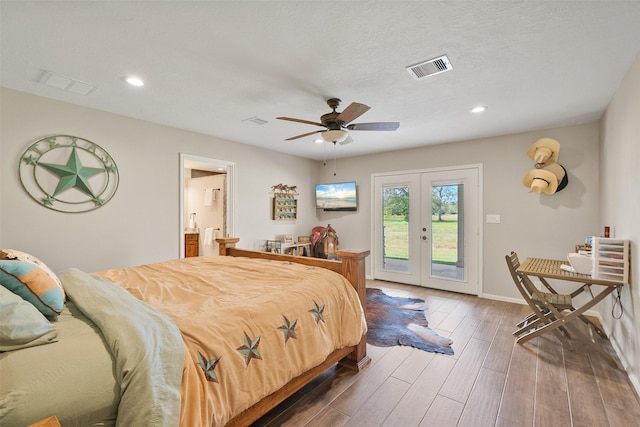 10723 Fm 442nd Rd, Boling, TX 77420 - bedroom with access to exterior, french doors, wood finished floors, recessed lighting, and baseboards