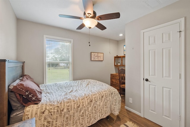 10723 Fm 442nd Rd, Boling, TX 77420 - bedroom with dark wood finished floors, recessed lighting, and ceiling fan