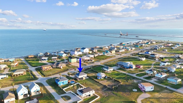 aerial view with a residential view and a water view