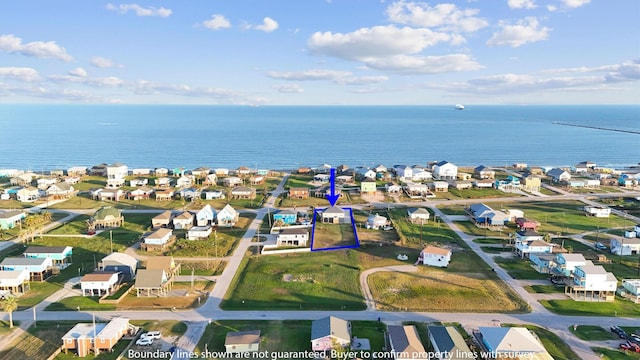 drone / aerial view featuring a water view and a residential view