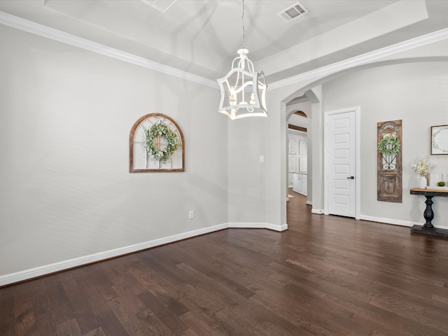 interior space featuring crown molding, a notable chandelier, and dark hardwood / wood-style floors