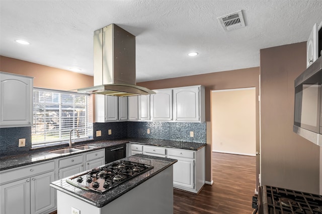 kitchen featuring island exhaust hood, white cabinets, black appliances, sink, and a center island