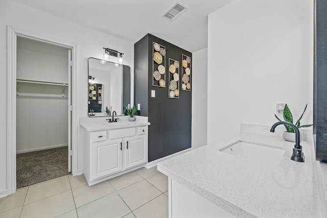 bathroom with vanity and tile patterned floors