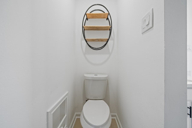 bathroom featuring toilet