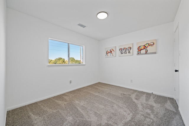 empty room featuring carpet floors