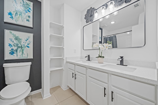 bathroom featuring vanity, toilet, curtained shower, and tile patterned flooring