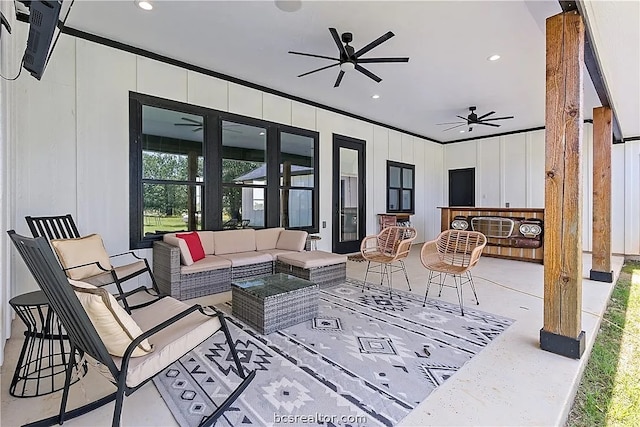 view of patio with outdoor lounge area and ceiling fan