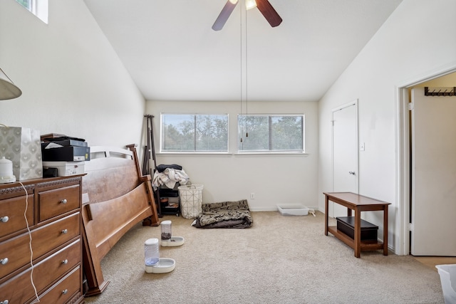 bedroom featuring vaulted ceiling, carpet floors, and ceiling fan