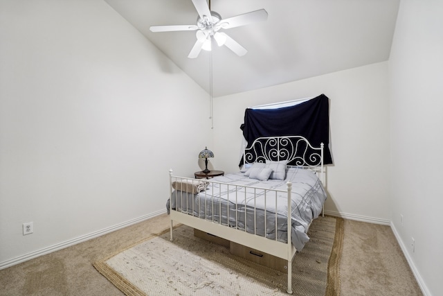 bedroom featuring ceiling fan, carpet flooring, and vaulted ceiling