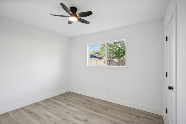 unfurnished room featuring light hardwood / wood-style floors and ceiling fan