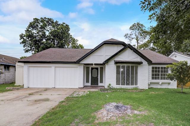 single story home featuring a front yard and a garage