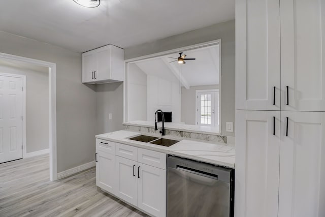 kitchen featuring vaulted ceiling with beams, sink, light wood-type flooring, stainless steel dishwasher, and white cabinetry