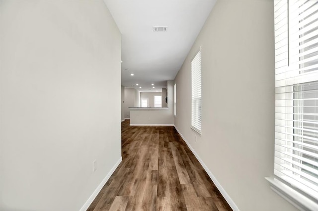 hallway featuring hardwood / wood-style flooring