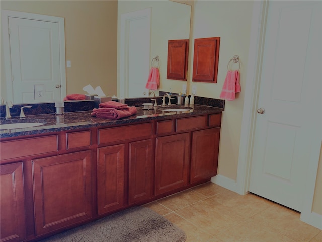 bathroom with vanity and tile patterned floors