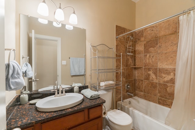 full bathroom featuring vanity, toilet, and shower / bath combination with curtain