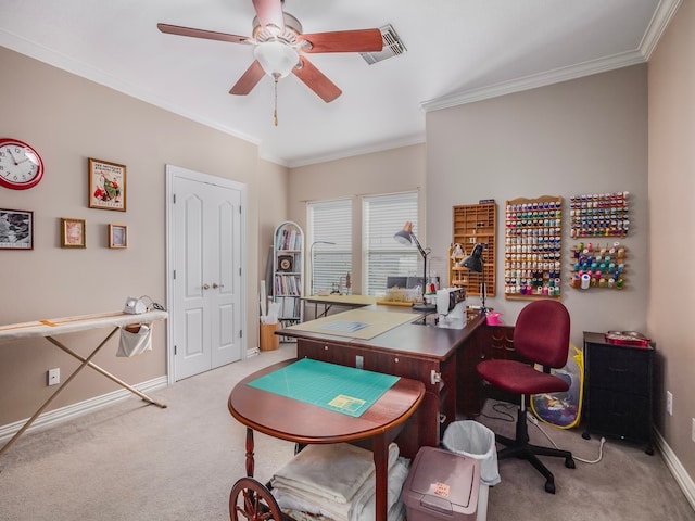 carpeted office space with crown molding and ceiling fan