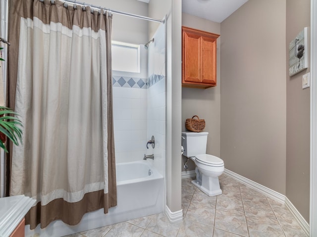 bathroom with toilet, tile patterned floors, and shower / tub combo