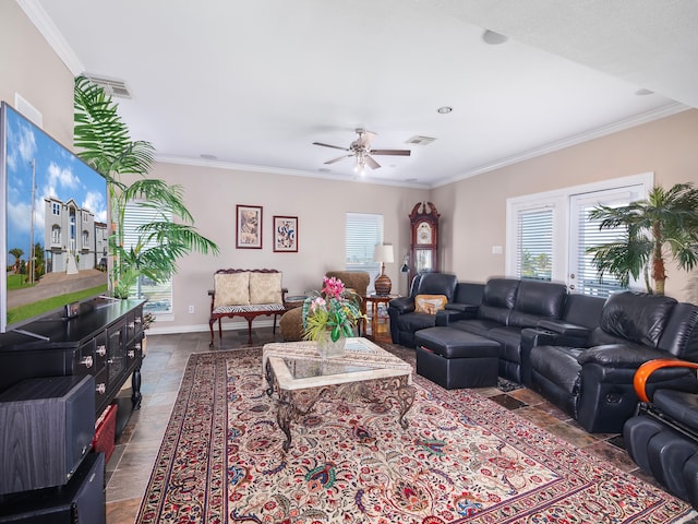 living room featuring ceiling fan and ornamental molding