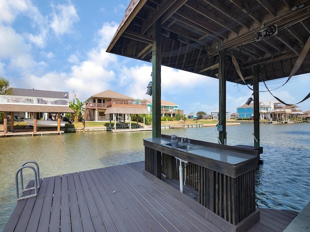 dock area featuring a water view